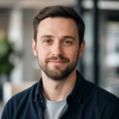 Realistic professional author portrait, neutral background, subtle lighting, suitable for informational website author block